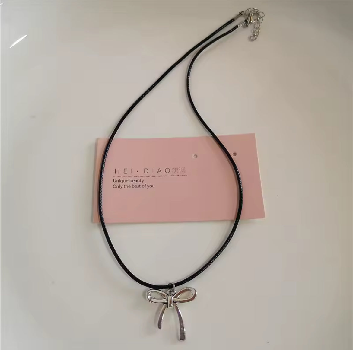 Necklace silver bow